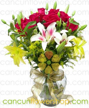 Lilies and roses in a glass vase