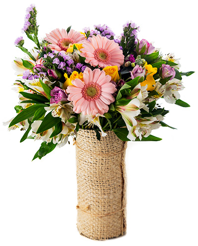 Mixed flower arrangement in jute covered base