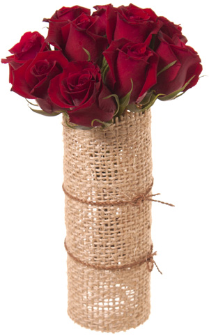 12 red roses in jute covered cylinder