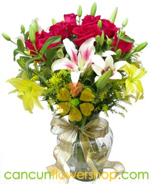 Roses and lilies in a glass vase