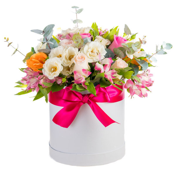 Mixed flowers in tall round box